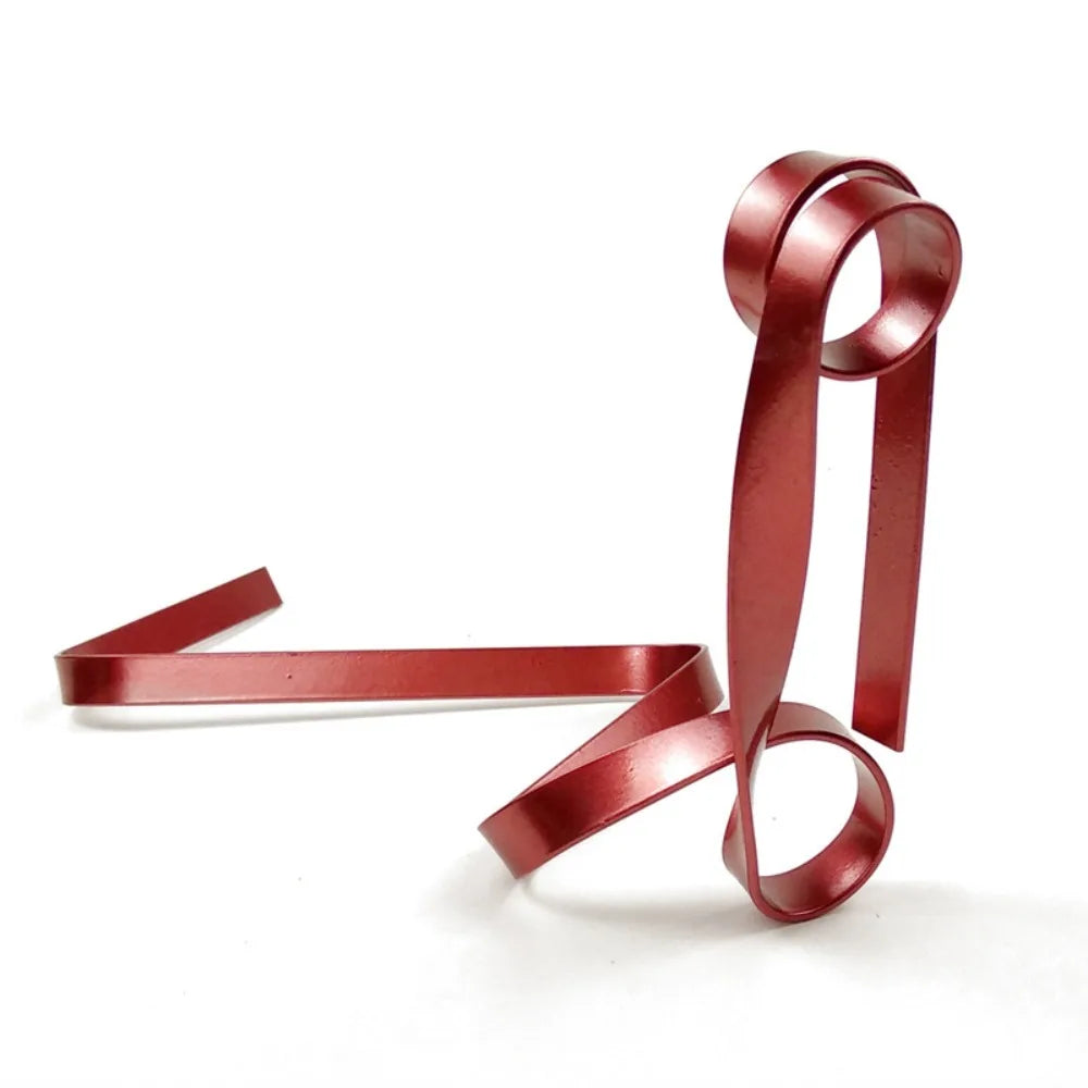 Floating Ribbon Wine Bottle Holder – Iron Suspended Rack for Table or Cabinet Display